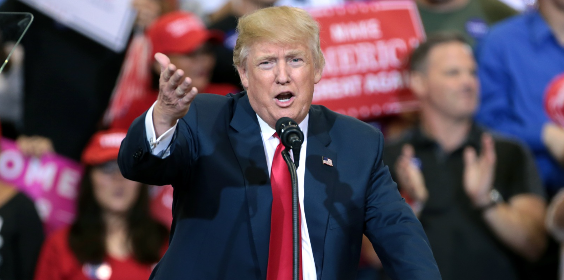 Donald Trump speaking with supporters at a campaign rally at the Phoenix Convention Center.