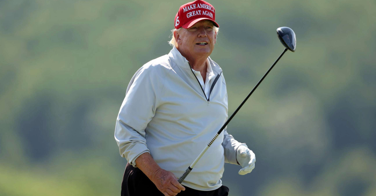 Donald Trump follows his tee shot during the pro-am prior to the LIV Golf Invitational - DC at Trump National Golf Club.