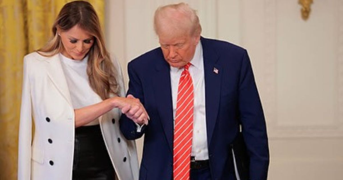 Donald Trump Offers His Hand to Melania for Help
