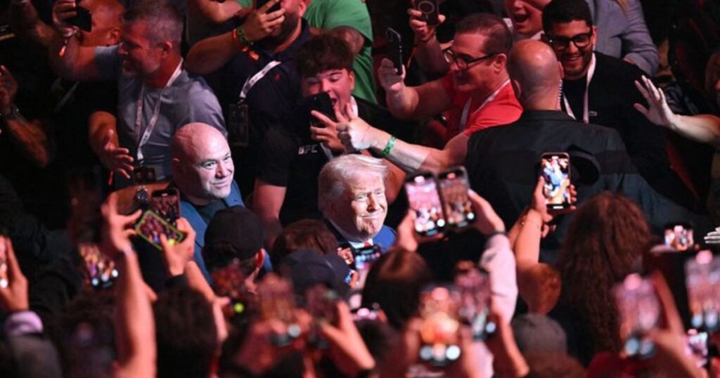 Donald Trump greeting the crowd at UFC event in New Jersey