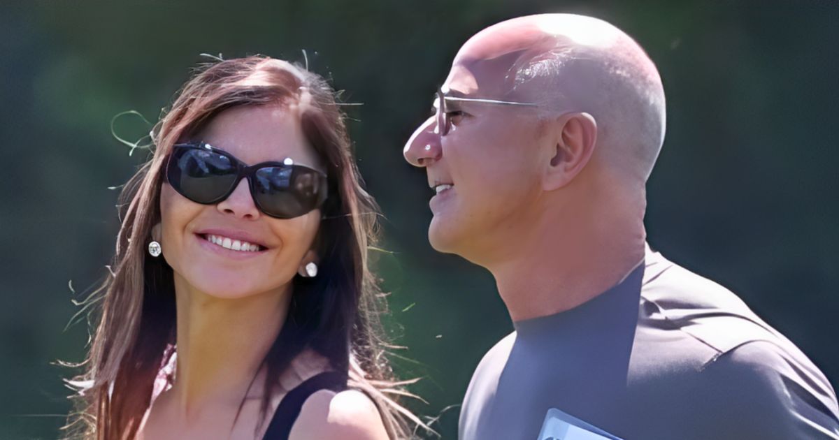 Jeff Bezos and Lauren Sánchez walking at the Sun Valley Conference with Bezos showing off new grey hair