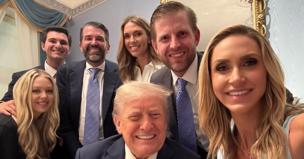 Donald Trump posing with his family on his 79th birthday