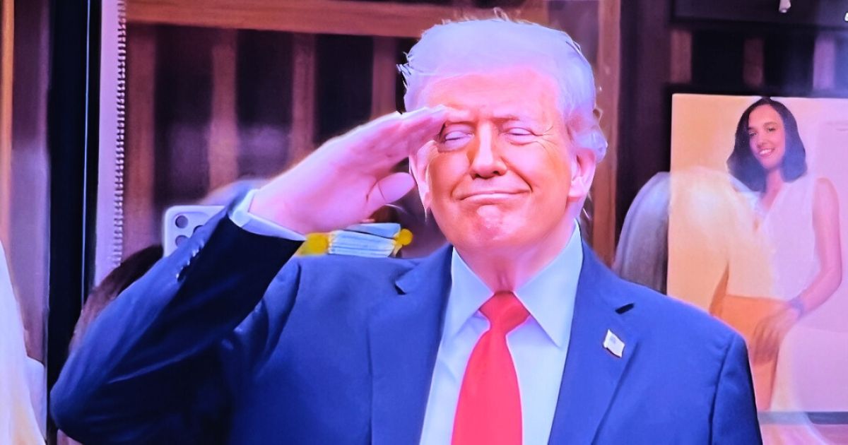 Donald Trump smirks after being booed during the U.S. Open men’s final.