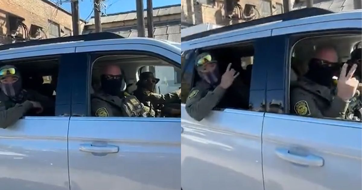 A viral video shows masked ICE agents detaining several people while a resident confronts them for “protecting” U.S. citizens