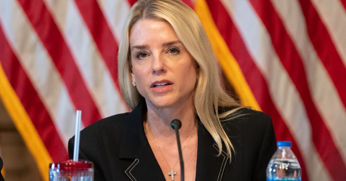 Pam Bondi’s awkward chin tilt needs a major lesson while posing