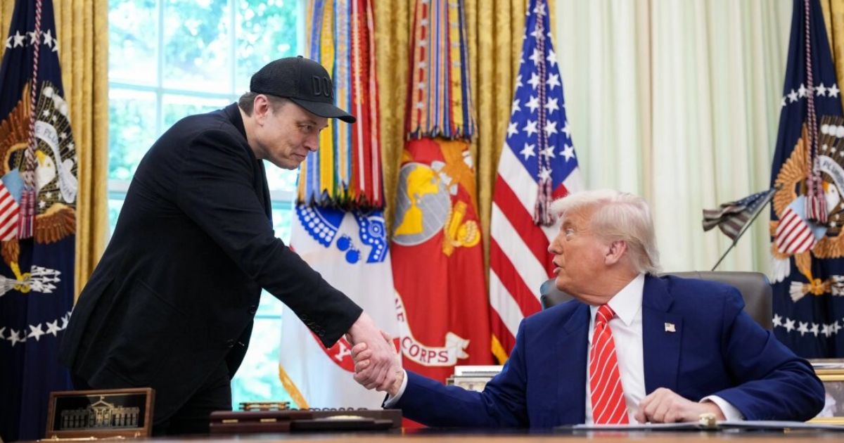 Elon Musk pictured with Donald Trump